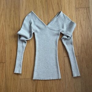 Light grey off the shoulder long sleeve alpaca blend sweater.